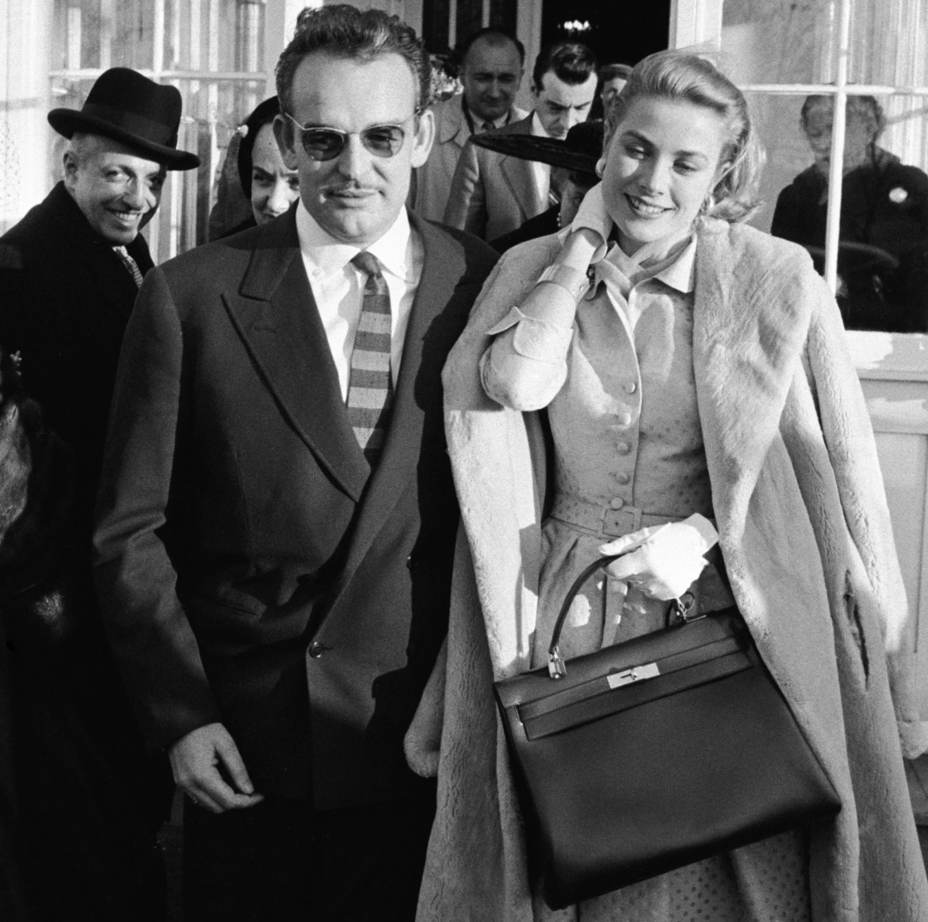 In 1956, a pregnant Grace Kelly, Princess of Monaco, hid her baby bump behind an Hermès bag 
