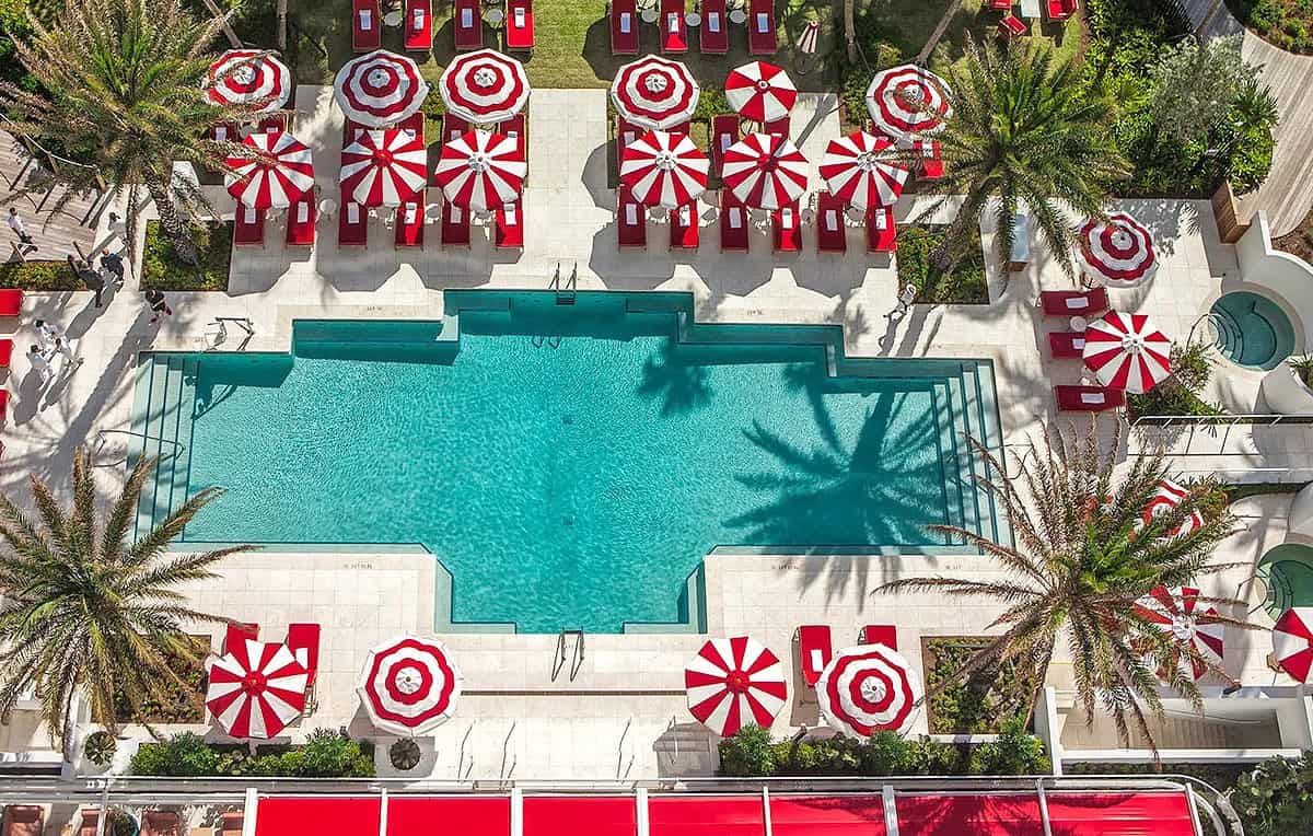 The hotel makes the most of its 100,000 square feet of private white sand beach with the Faena Beach Club, which has adorable red-and-white candy-striped lounge chairs, plus a range of private cabanas that can accommodate large groups.